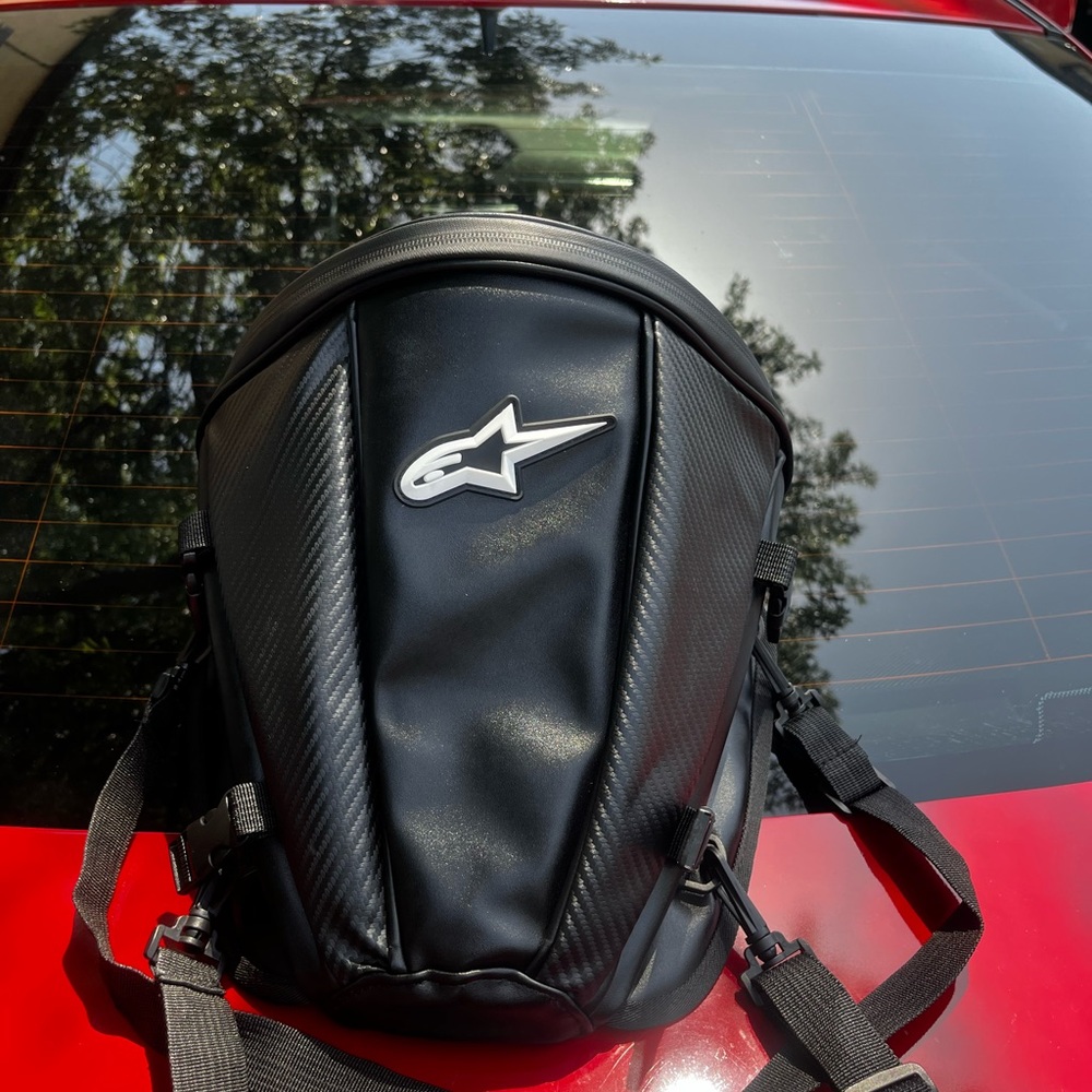 Alpinestars backpack. New condition straps on to bike